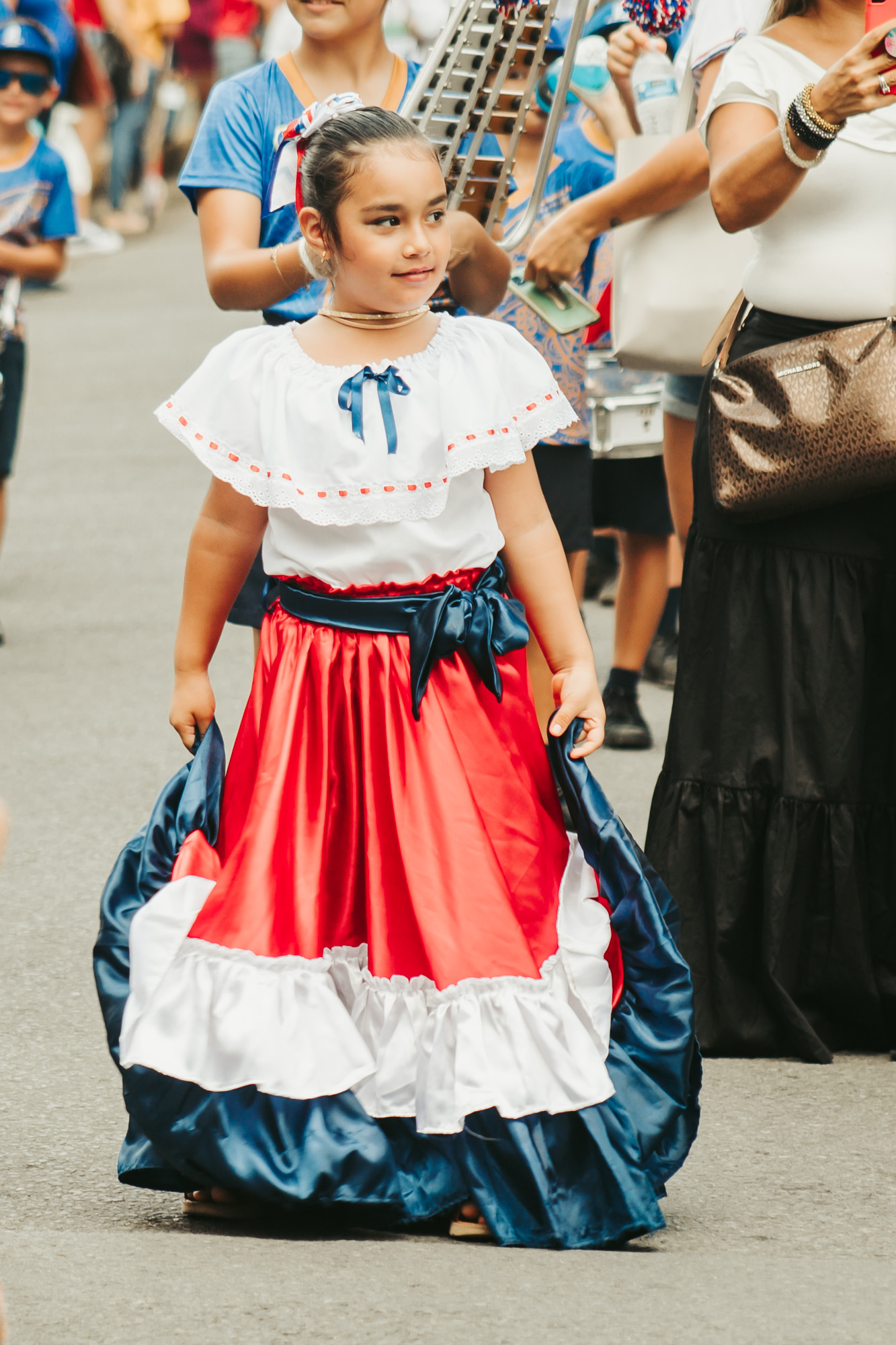 girl dancing in the independence day parade