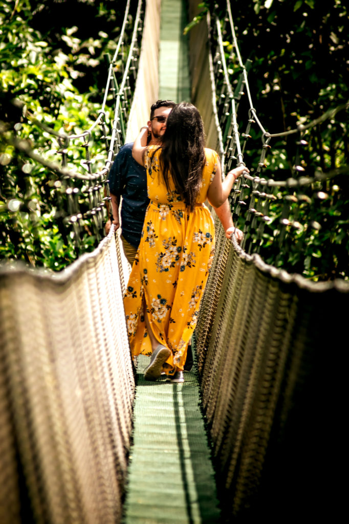 Couple on the suspension bridge at Los Campesinos for a waterfall photoshoot
