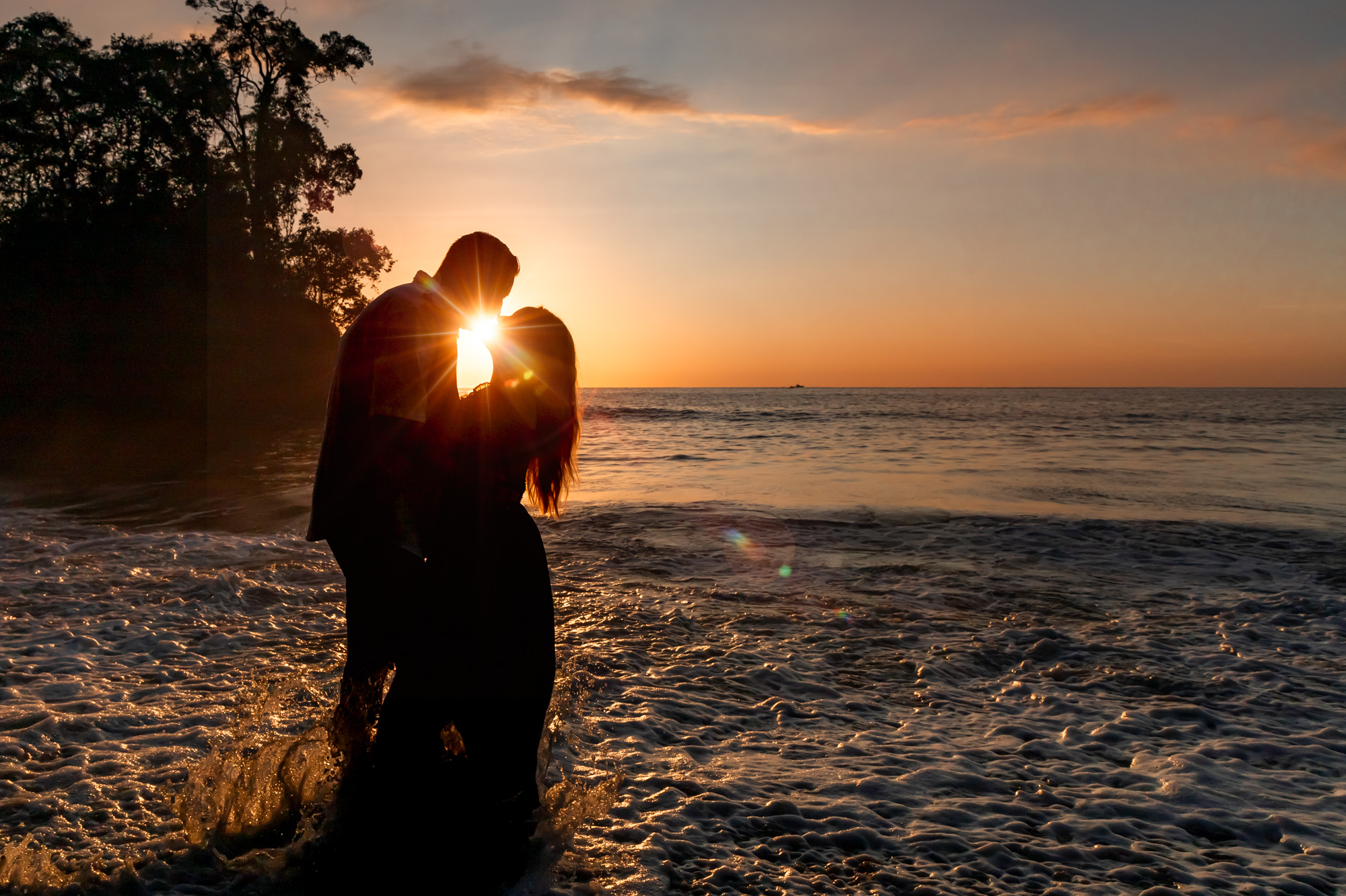Couple touching foreheads on Manuel Antonio beach