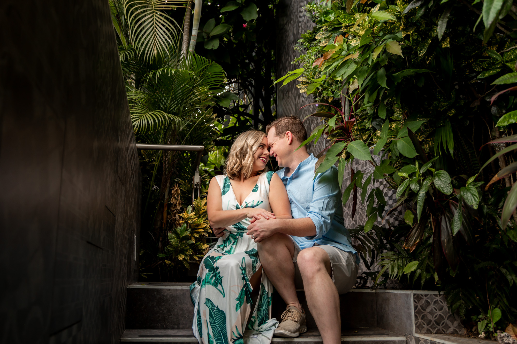 couple snuggled together laughing